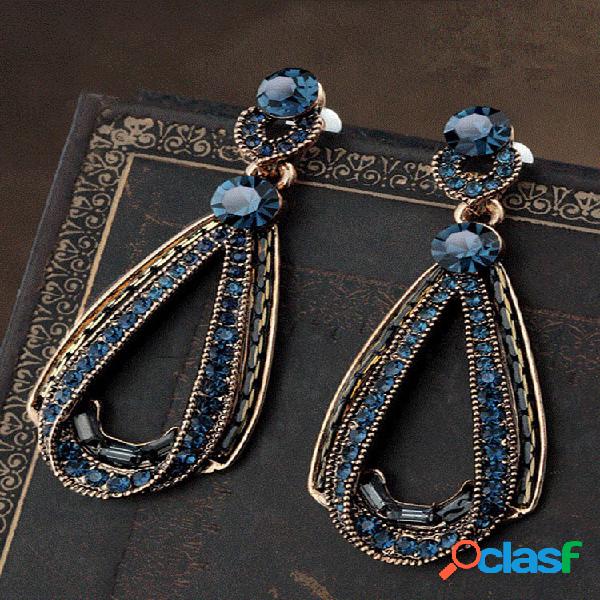 Pendientes vintage lujosos con cristales azules