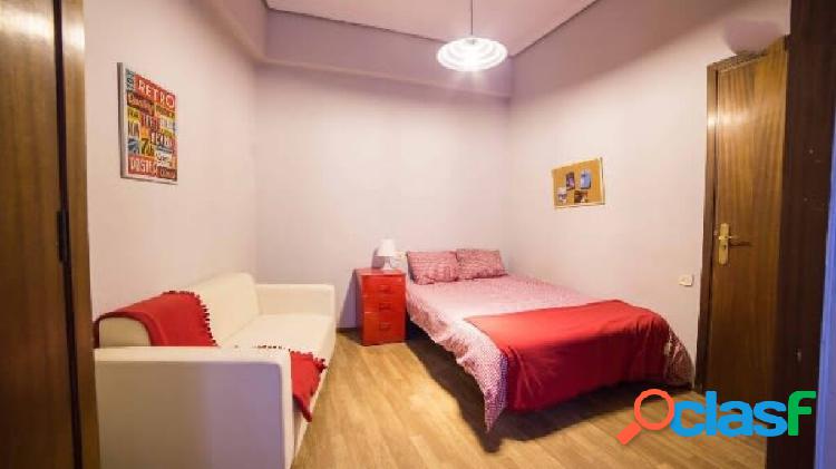 Aire room in a coliving apartment located on Calle de