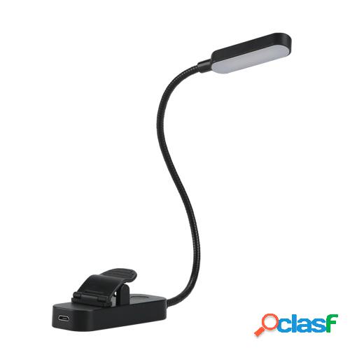 Luz LED con clip flexible en el libro Luz de lectura para