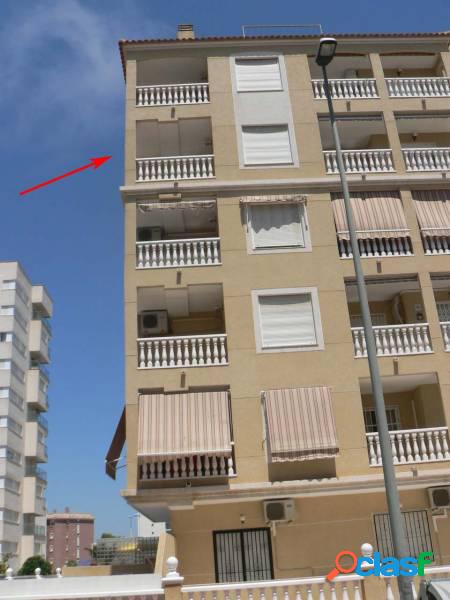 Apartamento de dos habitaciones con piscina comunitaria