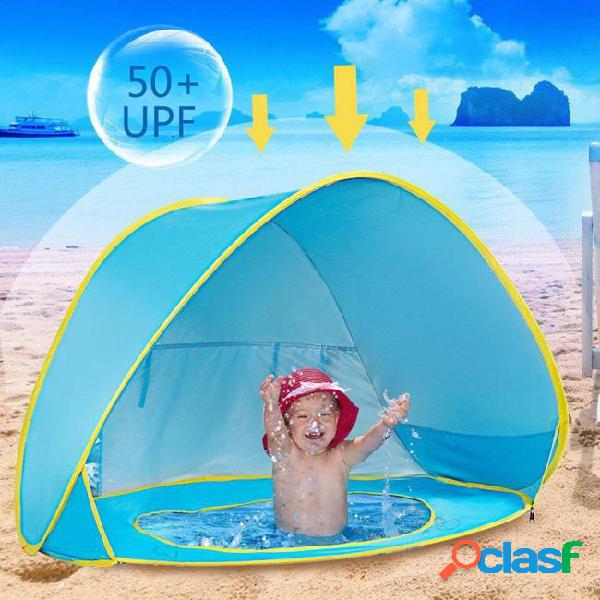 Baby beach tent uv-protecting sun shelter with a pool