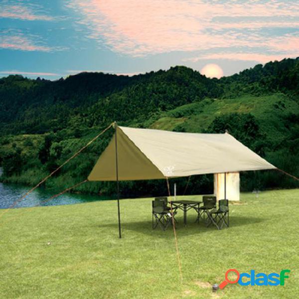 Outdoor ultralight sun shelter between beach tent
