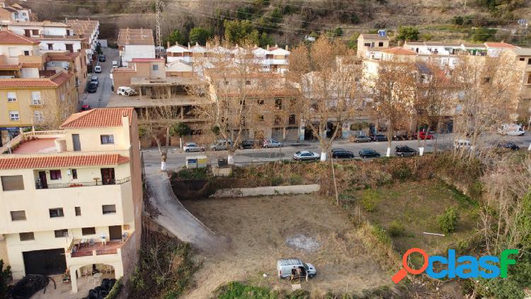 Parcela en Lanjar\xc3\xb3n en la calle principal del pueblo
